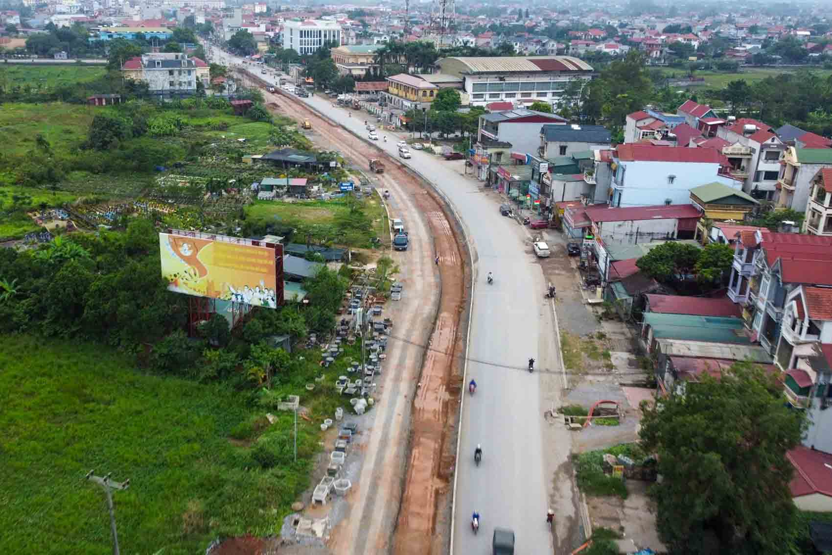 Dự án mở rộng Quốc lộ 32 giai đoạn 1 đoạn qua xã Quảng Oai, Hà Nội. Ảnh: Sóng Hữu