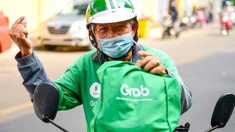 Grab lần đầu có lãi