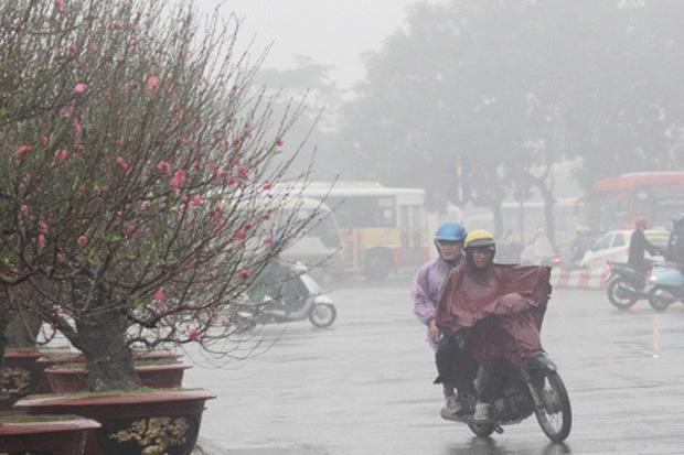 Miền Bắc đón không khí lạnh cực mạnh, mưa rét tê tái, nền nhiệt Hà Nội giảm sâu chỉ còn 12 độ C - Ảnh 1.