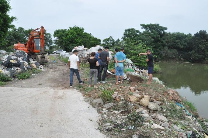 Người đàn ông đổ trộm hơn 353 tấn rác thải gây ô nhiễm môi trường bị khởi tố - Ảnh 3.