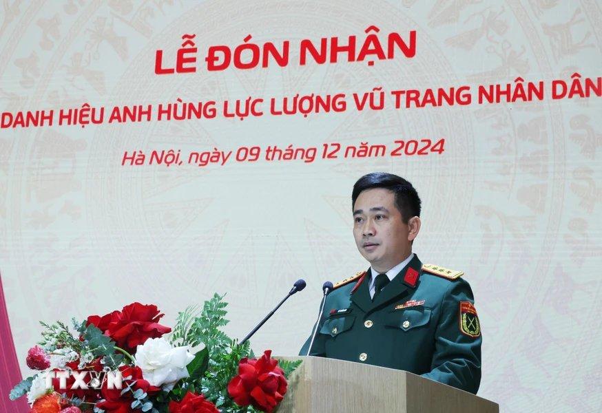 Thượng tá Vũ Tuấn Anh - Viện trưởng Viện Hàng không vũ trụ Viettel - trình bày báo cáo tại Hội nghị. Ảnh: Lâm Khánh/TTXVN