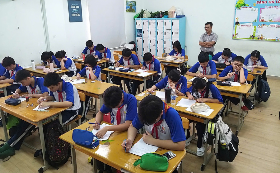 Tiết học của học sinh Trường THCS Huỳnh Khương Ninh (Quận 1, TPHCM). Ảnh: TT con-ap-luc-canh-tranh-vao-lop-10-1.jpg