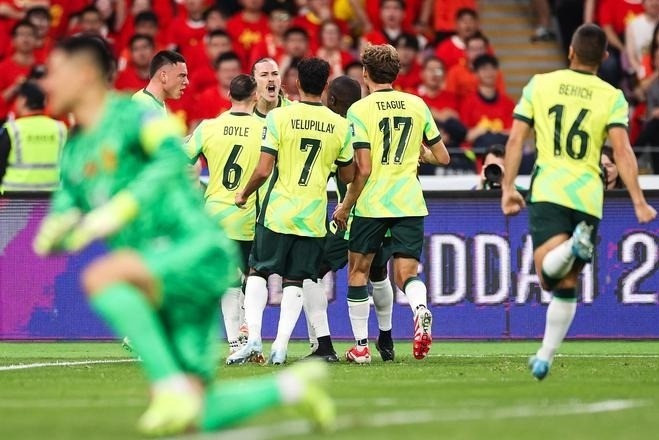 Các cầu thủ Australia ăn mừng trên sân Hàng Châu của tuyển Trung Quốc ở vòng loại World Cup 2026 khu vực châu Á tối 25/3. tq1.jpg