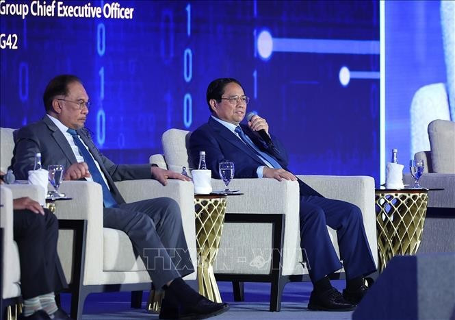 Thủ tướng Phạm Minh Chính phát biểu tại phiên thảo luận “Lưới thông minh kết nối thông qua hợp tác tự chủ AI”. Ảnh: Dương Giang/TTXVN.