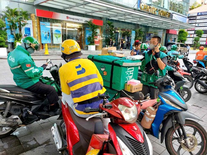 Phần lớn xe hai bánh công nghệ ở TPHCM là xe xăng. Ảnh: Minh Quân