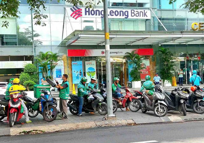 Đề xuất cấm hoàn toàn xe máy xăng chạy dịch vụ công nghệ từ cuối 2029 ở TPHCM