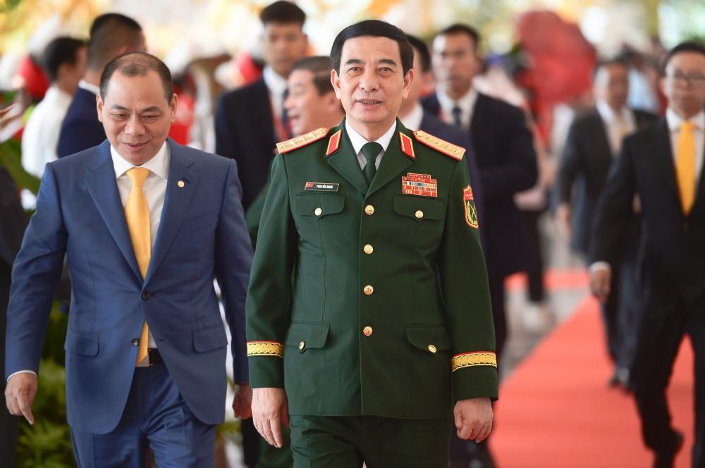 Đại tướng Phan Văn Giang - Ủy viên Bộ Chính trị, Phó Bí thư Quân ủy Trung ương, Bộ trưởng Bộ Quốc phòng đến dự lễ khai mạc triển lãm. Ảnh: Phạm Đông