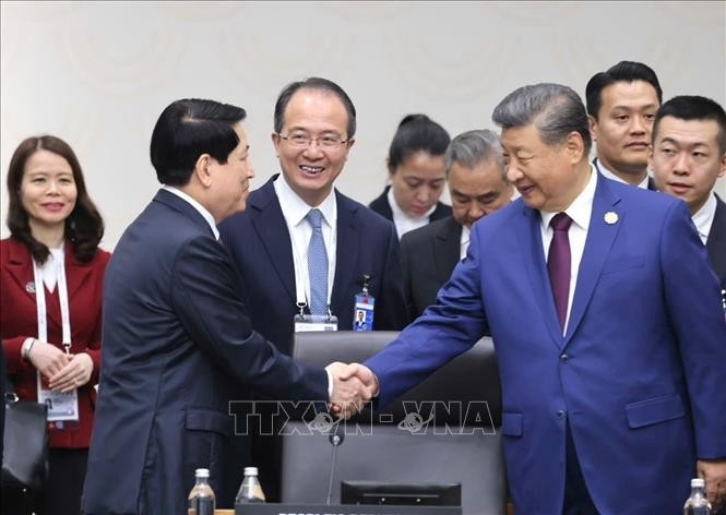 Chủ tịch nước Lương Cường với Tổng Bí thư, Chủ tịch nước Trung Quốc Tập Cận Bình. Ảnh: Lâm Khánh/TTXVN