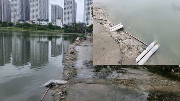 Hàng chục đường ống nước thải từ các hộ dân xả trực tiếp xuống hồ. Ảnh: Minh Hạnh