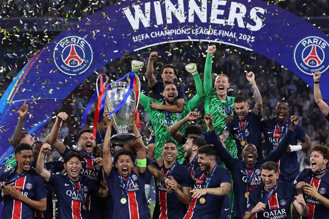 PSG vô địch Champions League dưới sự dẫn dắt của Enrique mùa trước.  Ảnh: AFP