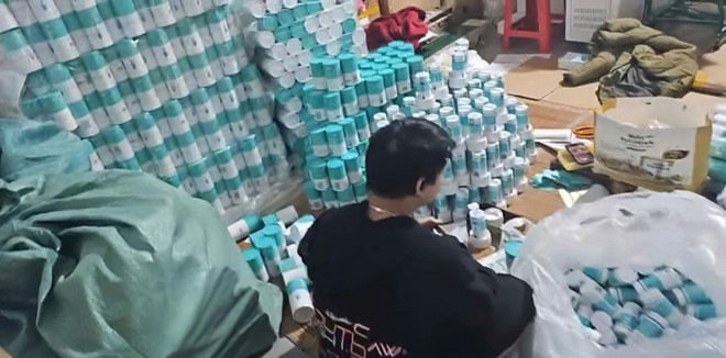 Triệt phá đường dây thuốc, thực phẩm chức năng giả quy mô lớn. Ảnh: Công an Thanh Hóa