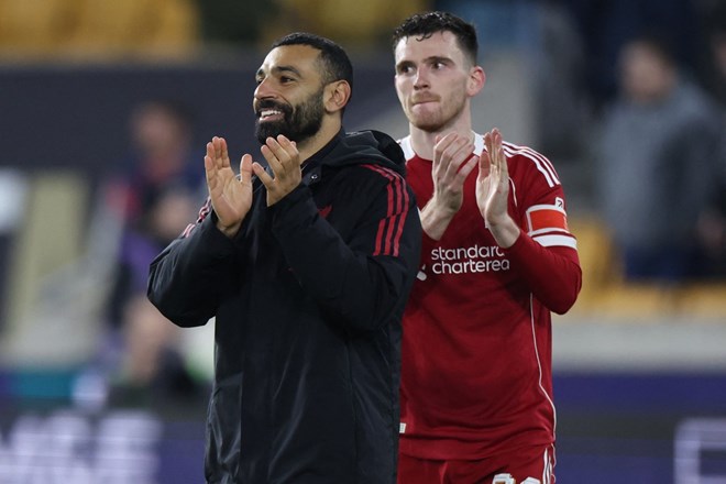 Cả Salah và Andy Robertson đều rời Anfield trong mùa hè 2026. Ảnh: AFP